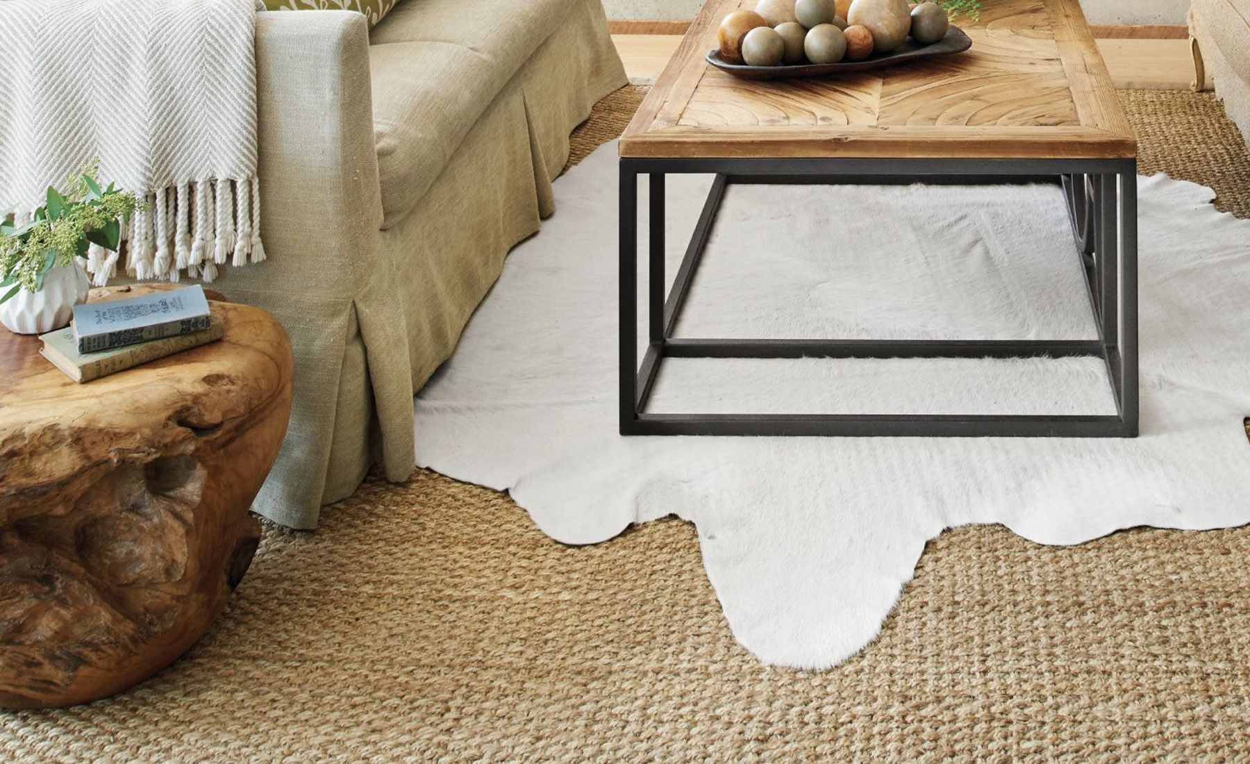 Anchor the Space: Layering area rugs can help define different areas within a room. Use rugs strategically to divide your space into smaller sections or create cozy nooks.